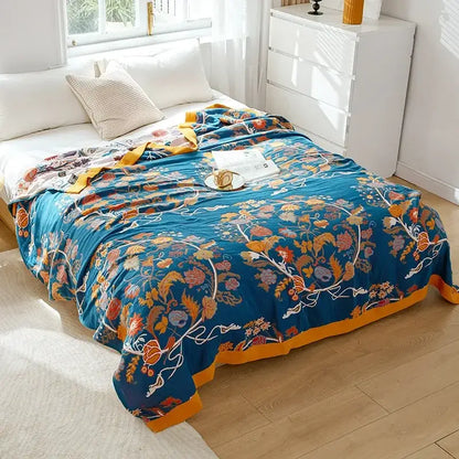 Vibrant blue decorbites cotton leisure blanket with floral patterns and mustard-yellow border for bedroom use