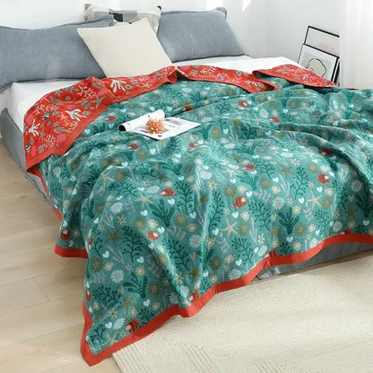 A cozy teal and red floral cotton leisure blanket with plush texture by decorbites cotton leisure for bedroom use