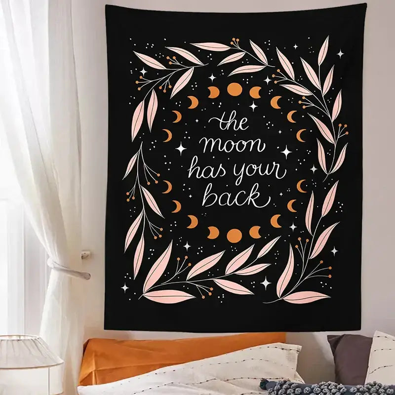 Black tapestry with botanical olive leaf moon phase design featuring pink leaves and orange moons for bedroom decorbites botanical olive