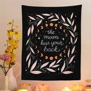 Black botanical olive leaf moon tapestry featuring pink and white leaves and celestial moons for bedroom decorbites decor