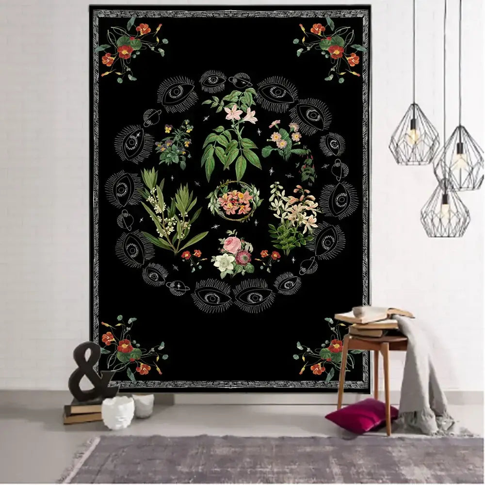 Black botanical sketch tapestry wall hanging with white floral illustrations and stylized eyes for gray bedroom decorbites decor