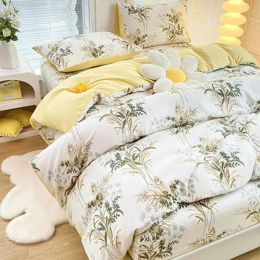 Yellow and white floral duvet cover set with green and gold botanical prints for bedroom bedding
