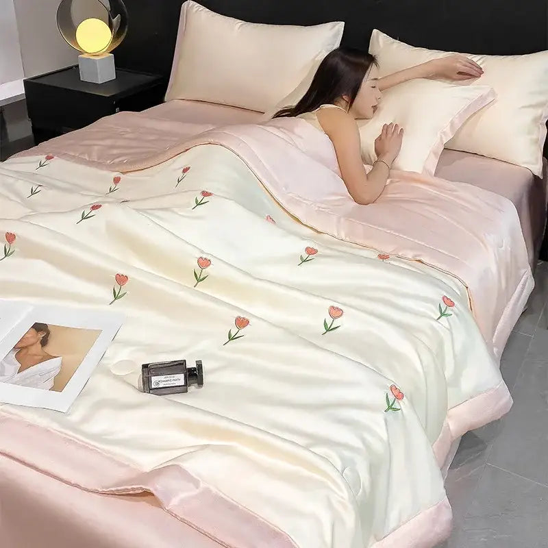 A cream and pink decorbites bowknot embroidered summer bedding set with satin-like quilt and delicate tulip embroidery