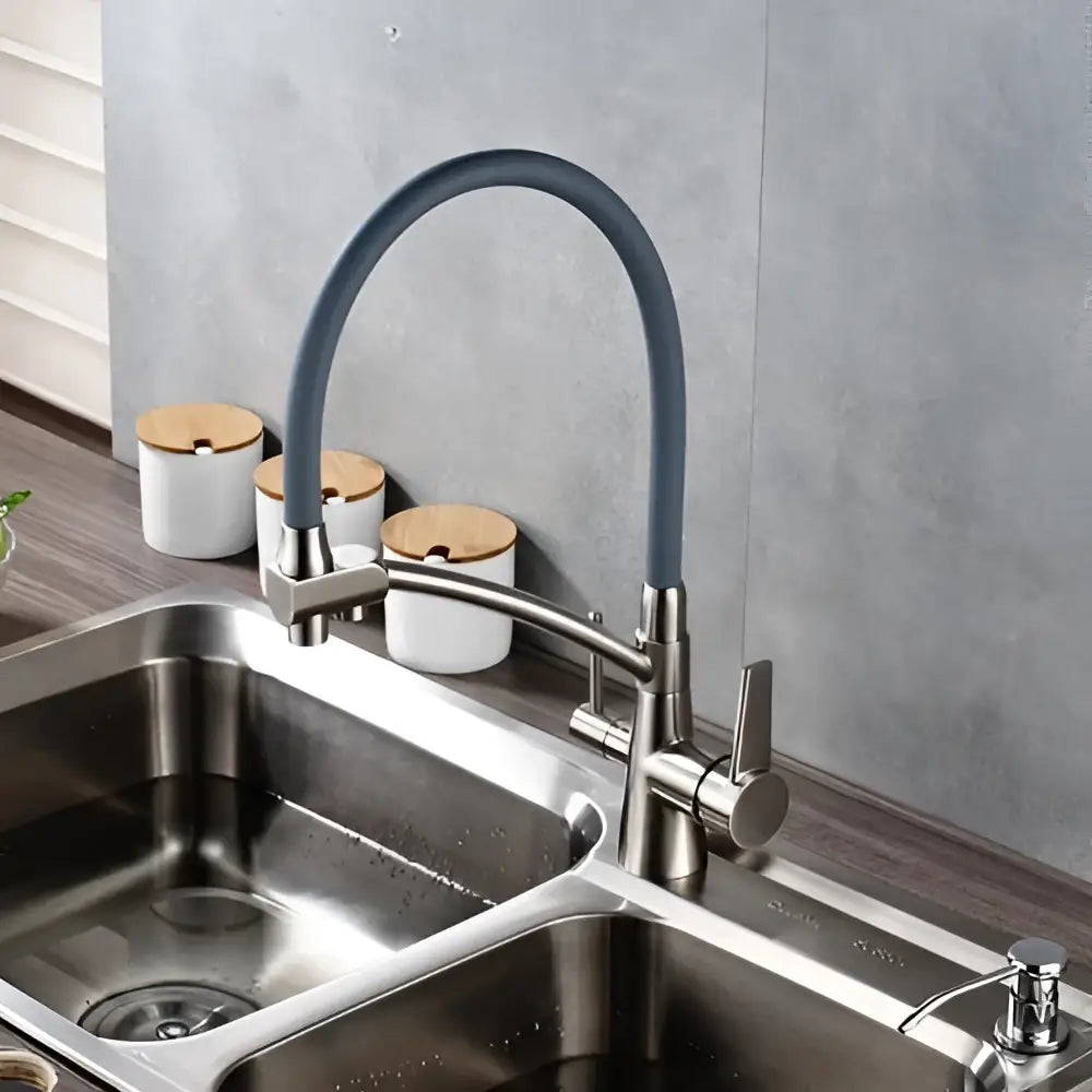 Modern stainless steel kitchen faucet with a flexible dark gray hose and brass and black dual handles decorbites dual spout