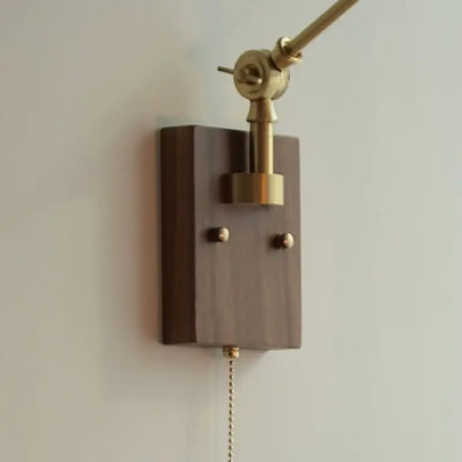 Brass and ribbed glass ceramic led wall light with brass finish and dark wood base featuring pull chain for bedroom sconce decorbites ceramic led wall