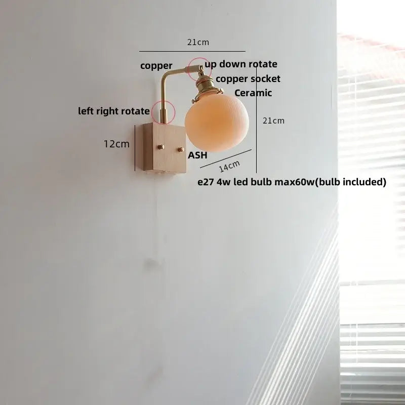 Brass and walnut ceramic led wall light with copper-finished wall sconce and matte ceramic globe shade for bedroom decorbites ceramic led