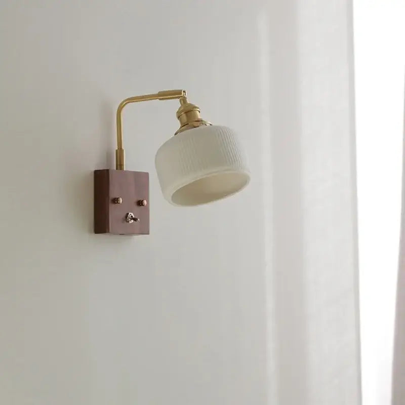 Brass and walnut ceramic led wall light with vintage brass arm and ribbed off-white glass shade for bedroom decorbites ceramic led wall