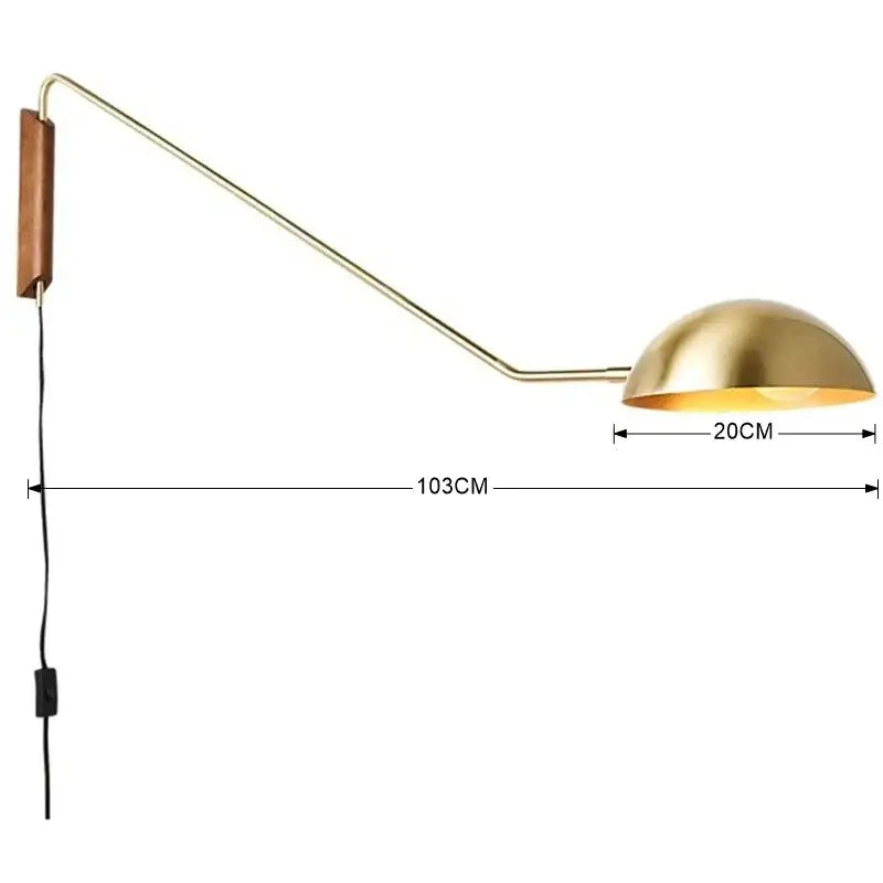 Brass and wood adjustable metal wood wall lamp with curved arm and wooden backplate for bedroom reading light