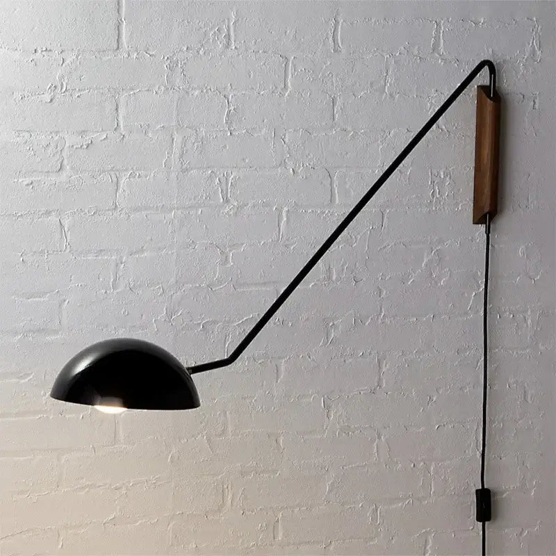 Black matte wall lamp with curved arm and wooden accent adjustable metal wood wall lamp for bedroom reading light