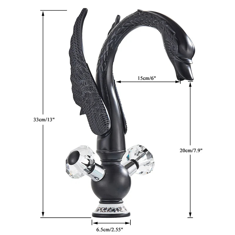 Brass basin faucet deck mounted with black swan design antique brass finish and crystal knob detailing