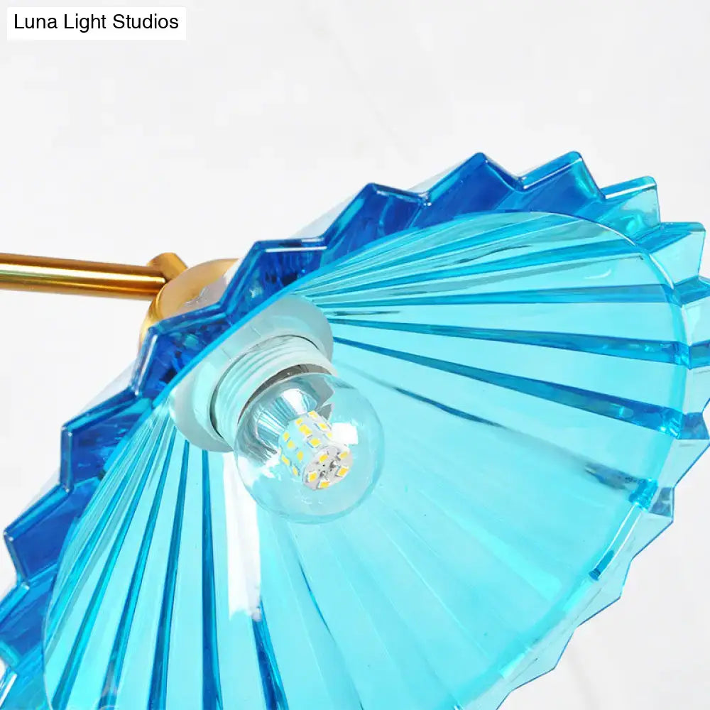 DecorBites blue ribbed glass cone pendant light with translucent blue ribbed glass and gold-toned fixture for dining rooms