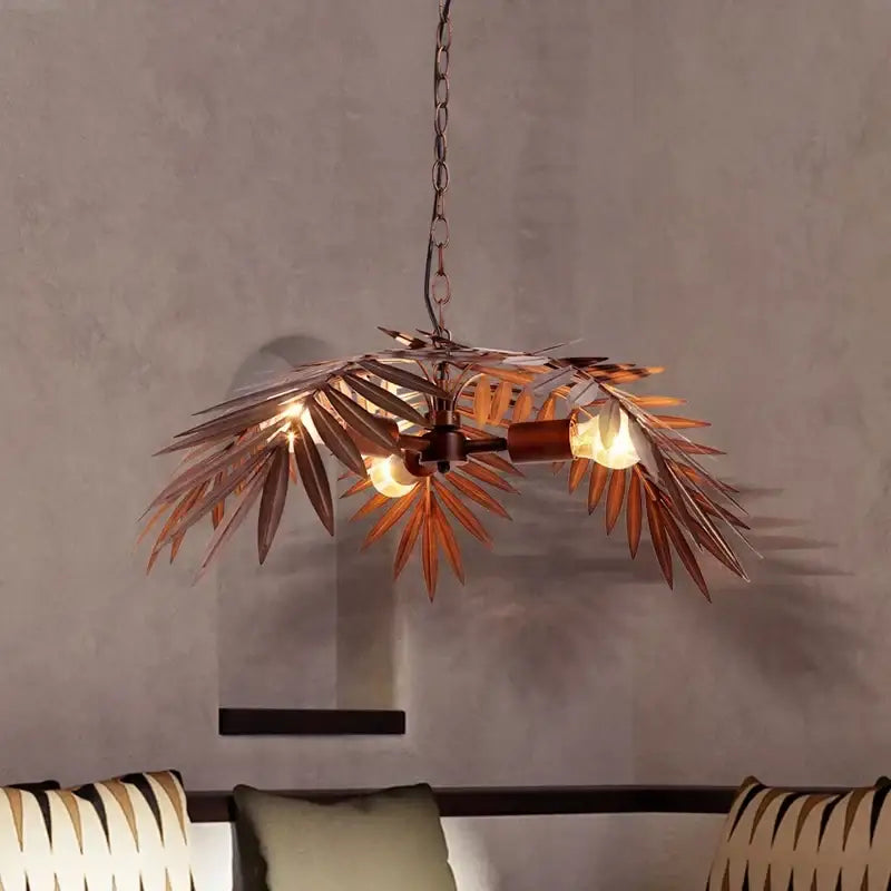 Bronze-finished metal boho coconut leaf chandelier with exposed bulbs for dining room decorbites boho coconut lighting