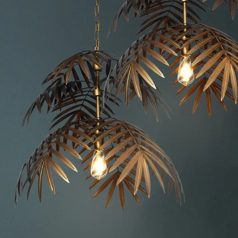 Brass finish boho coconut leaf chandelier with exposed filament bulbs for elegant dining room decorbites boho coconut lighting