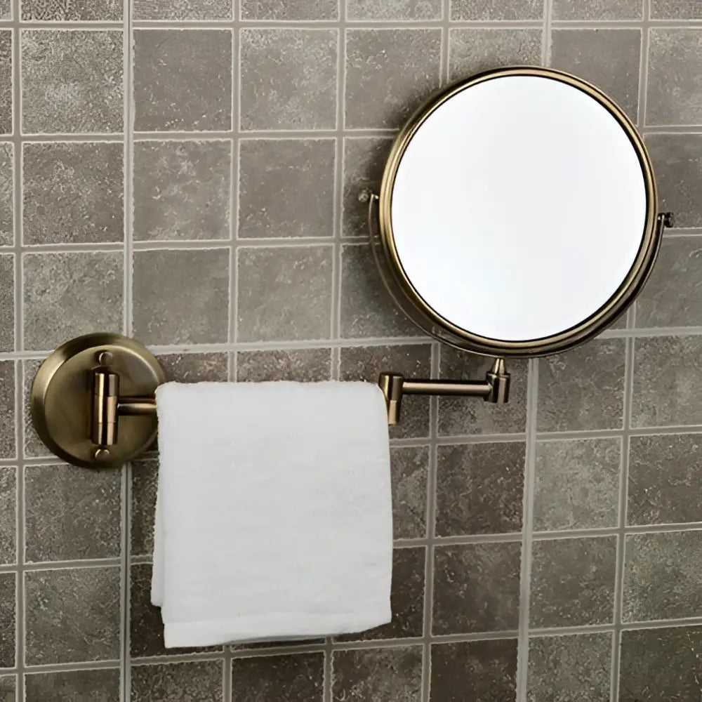 Brass bronze folding adjustable wall-mounted magnifying mirror with integrated towel rack for bedroom decorbites brass bronze