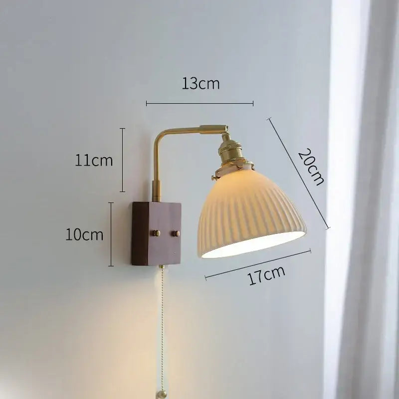 Vintage-style wall light with brass-finished arm and off-white ribbed glass shade led wall light for living room