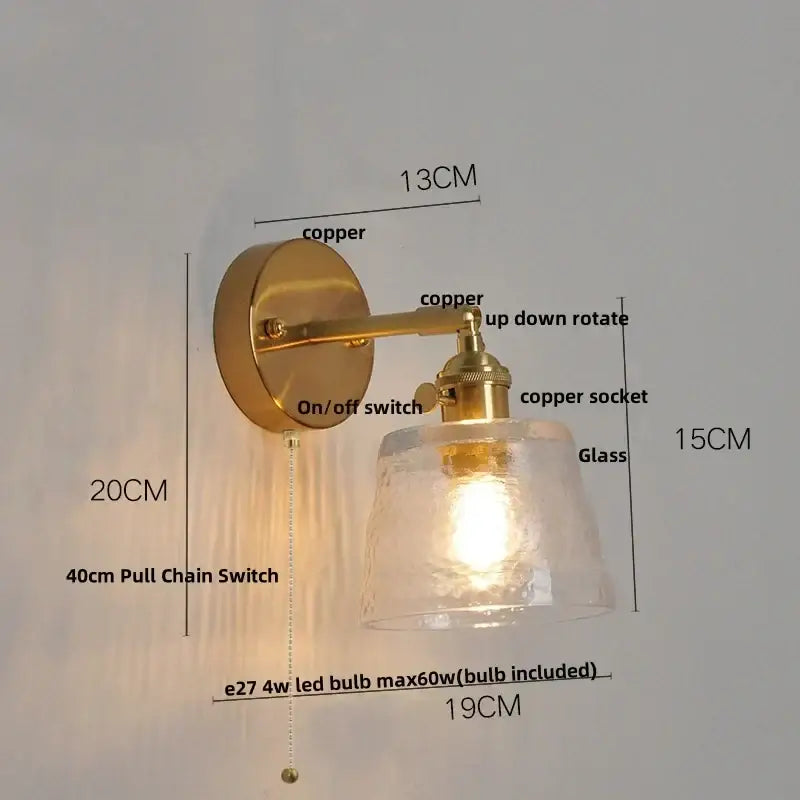 Vintage-style brass wall sconce with decorbites clear glass led shade and pull chain for bedroom lighting