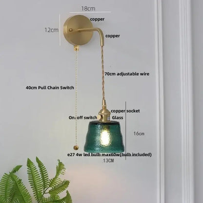 Copper-finished wall sconce with textured teal clear glass led shade and adjustable twisted wire for decorbites clear glass lighting