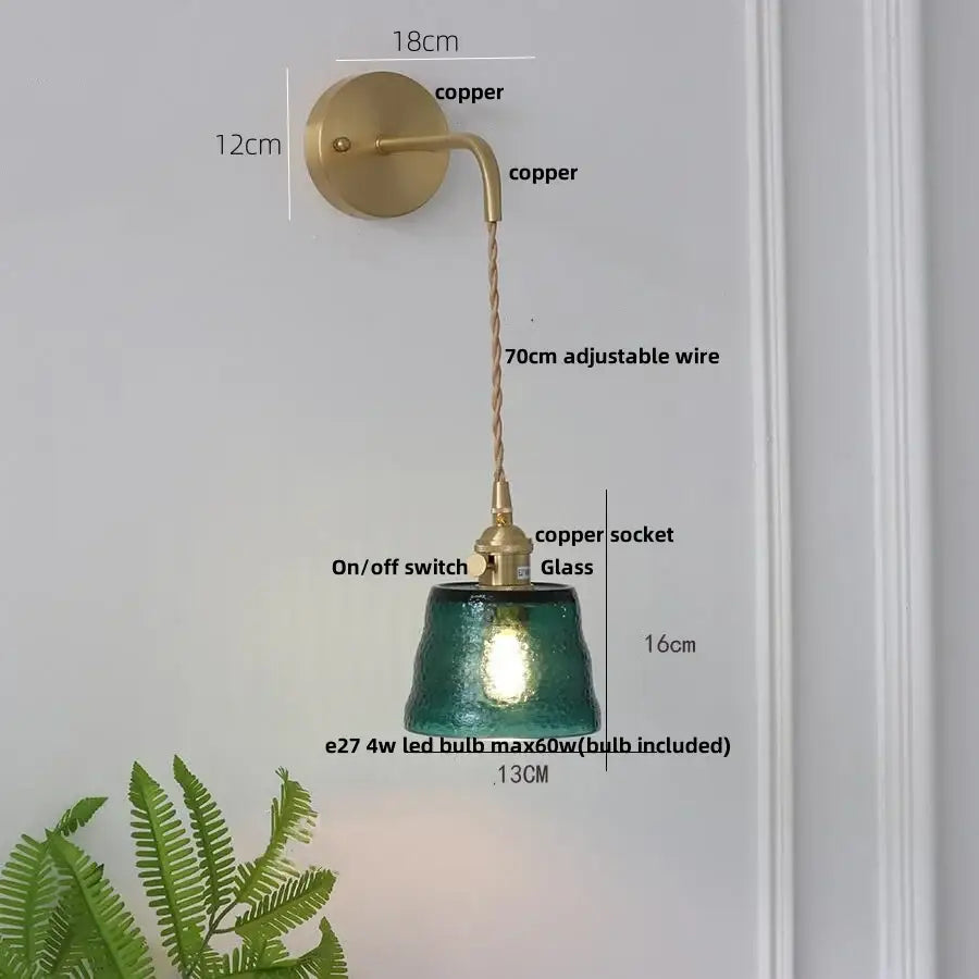 Teal green textured glass wall sconce with copper finish and adjustable wire decorbites clear glass led bedroom light