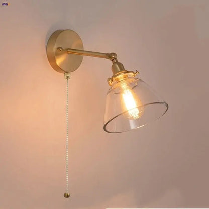 Brass finish wall lights with clear glass shade and exposed filament bulb for bedroom reading by decorbites clear glass