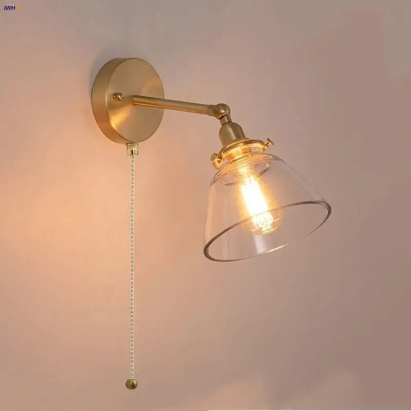 Brass finish wall lights with clear glass shade and exposed filament bulb for bedroom reading by decorbites clear glass