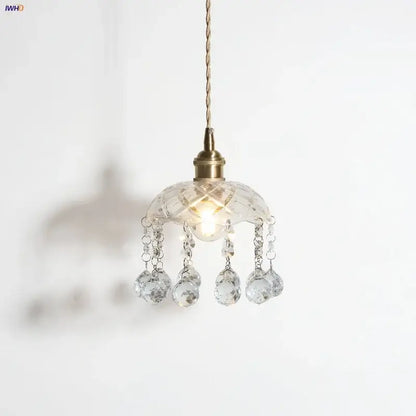 A brass pendant light with clear glass led faceted shade and crystal teardrop pendants by decorbites for dining room decor