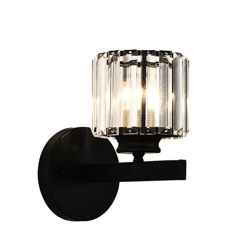 Black wall sconce with cylindrical crystal glass shade featuring decorbites crystal glass for bedroom lighting