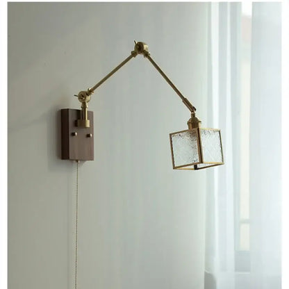 Brass decorbites ash wood blue glass wall sconce with adjustable brass finish and textured glass shade for bedroom lighting