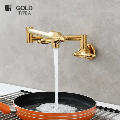 Gold-finished decorbites brass double joint telescopic kitchen faucet with ornate handles and two spray modes