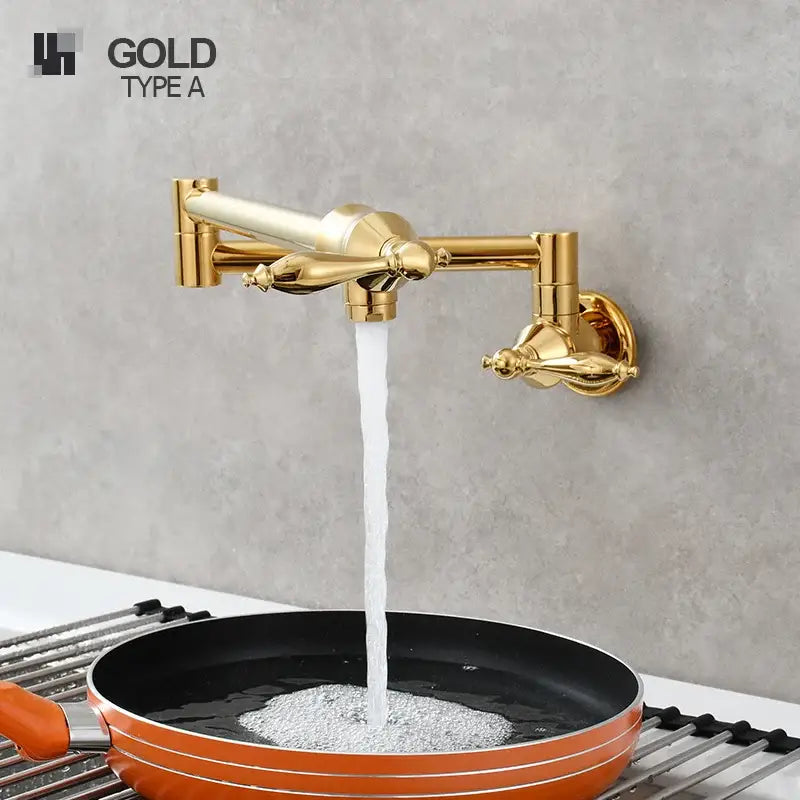Gold-finished decorbites brass double joint telescopic kitchen faucet with ornate handles and two spray modes