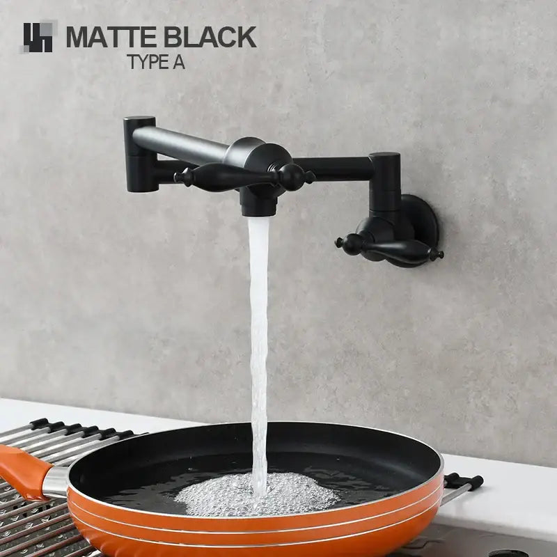 Matte black brass double joint telescopic kitchen faucet with sleek articulated design and ornate handles decorbites brass double