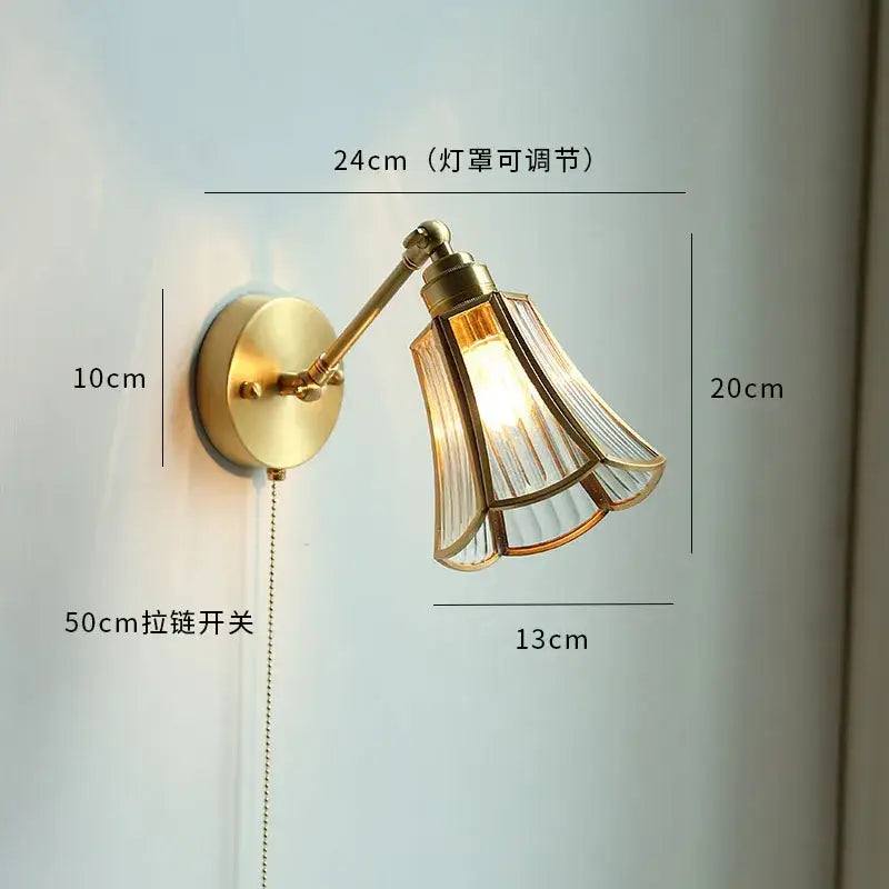 Brass-finished adjustable glass copper led wall sconce with fluted shade and pull-chain switch for bedroom mirror