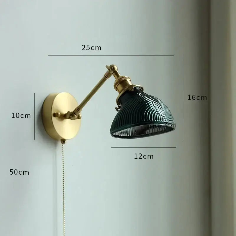 Vintage-style brass glass copper led wall sconce with dark green ribbed shade and adjustable arm for bedroom mirror