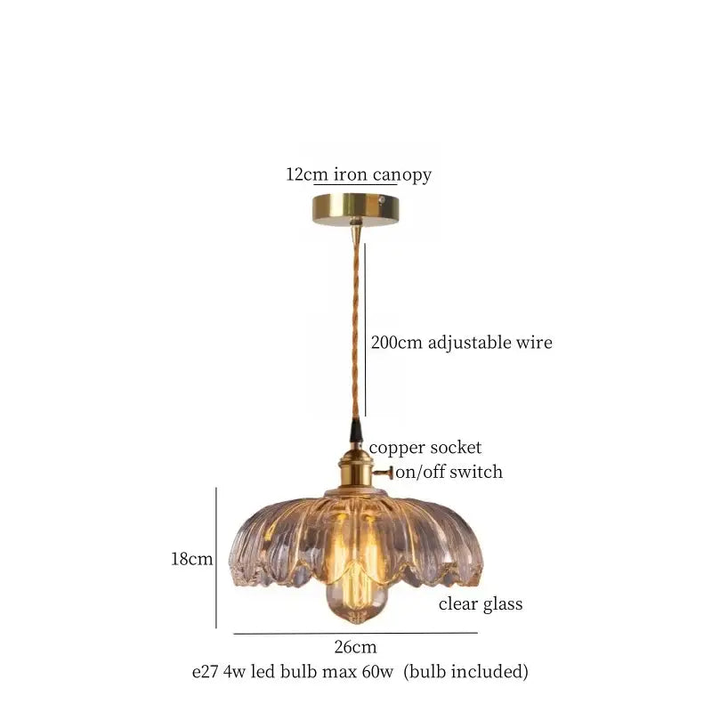 A clear glass pendant lamp with fluted lotus leaf design and brass glass lotus metal accents for dining room decorbites brass glass