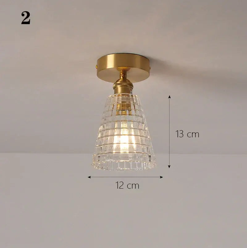 Vintage-style ceiling lamp with brass-finished metal base and clear faceted glass shade pendant for kitchen lights