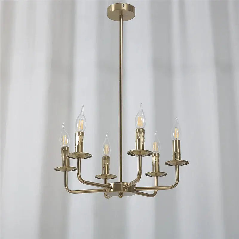 Brass-finished iron art chandelier lights with six candle-style bulbs for dining room decorbites iron art fixture