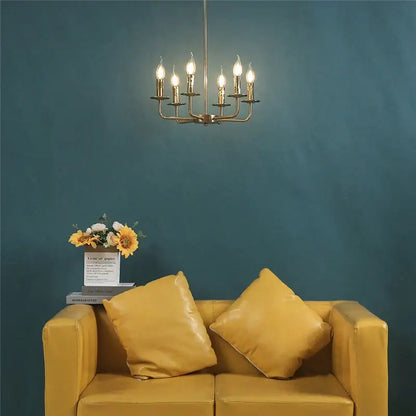 Brass iron art chandelier lights with six lit candle-style bulbs for dining room decorbites iron art chandelier