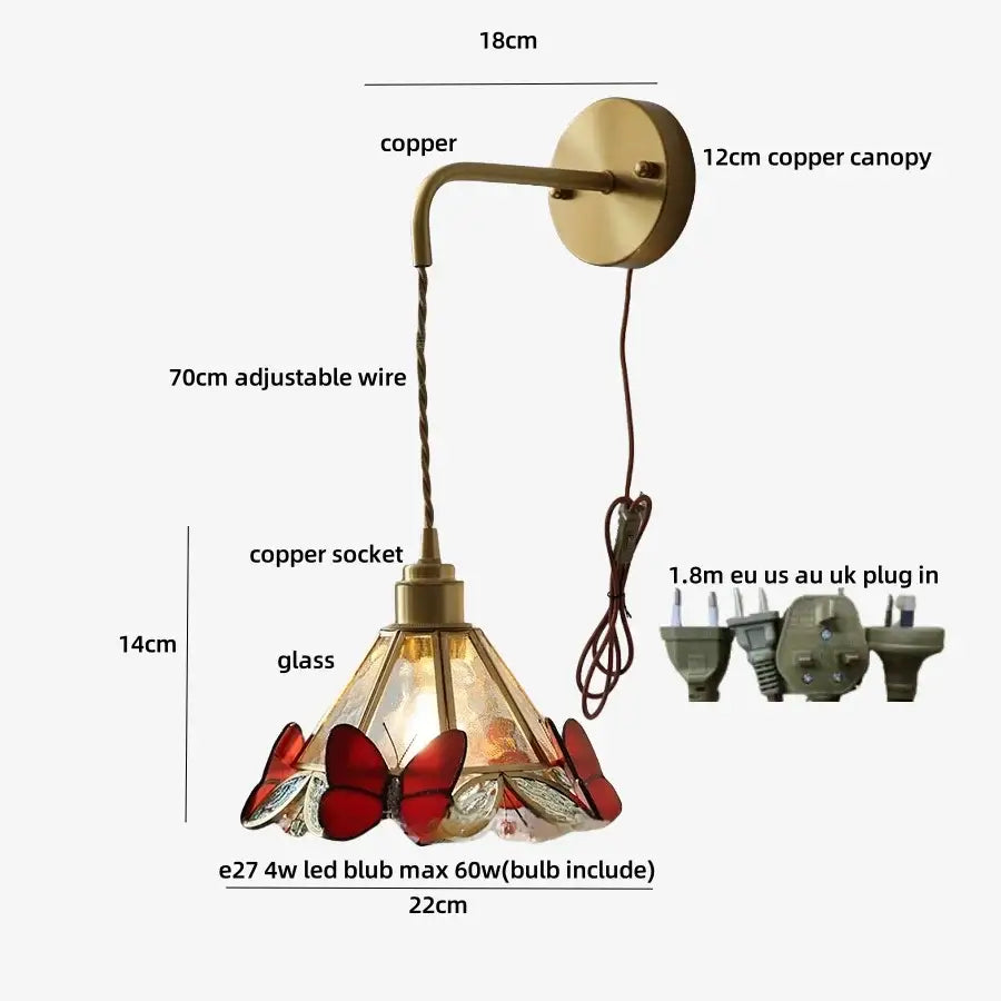 A vintage-style copper wall light fixture with a stained glass orange and red butterfly shade for bedroom use
