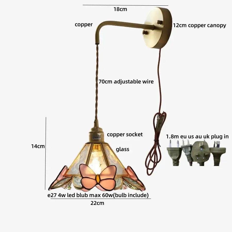 Brass orange butterfly stained glass wall light fixture with copper and glass featuring pink peach and amber hues