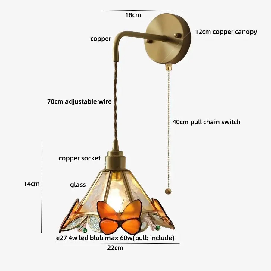 Vintage-style copper wall light fixture with stained glass orange butterfly and green accents for bedroom sconce