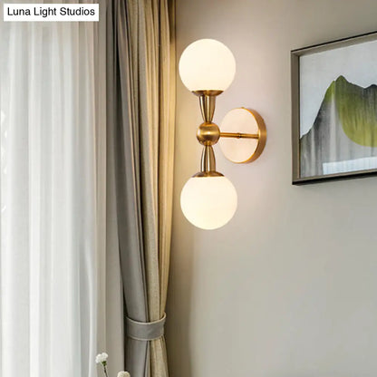DecorBites™ Brass Orb Wall Mount Light with Opal Glass Lampshade - Mid Century Wall Lighting Idea