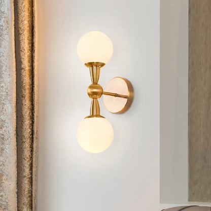 DecorBites™ Brass Orb Wall Mount Light with Opal Glass Lampshade - Mid Century Wall Lighting Idea