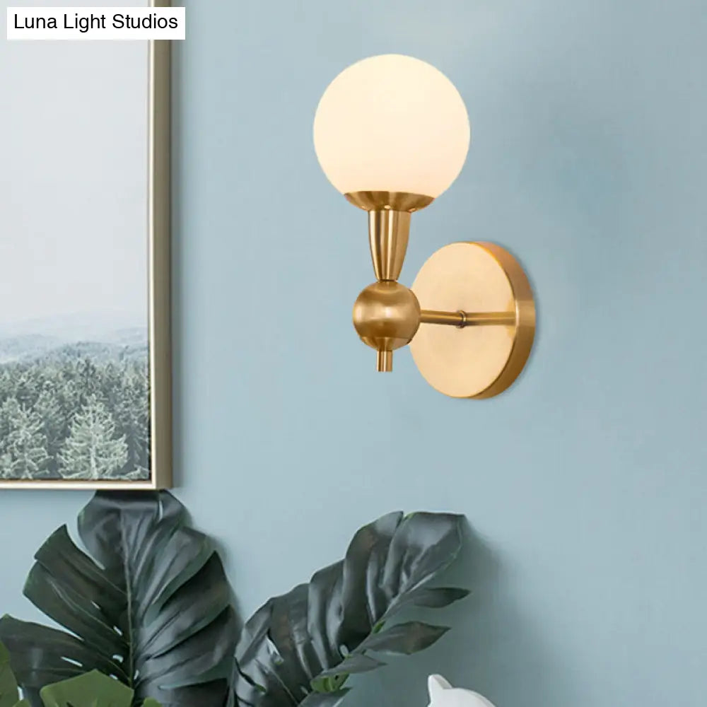 DecorBites™ Brass Orb Wall Mount Light with Opal Glass Lampshade - Mid Century Wall Lighting Idea