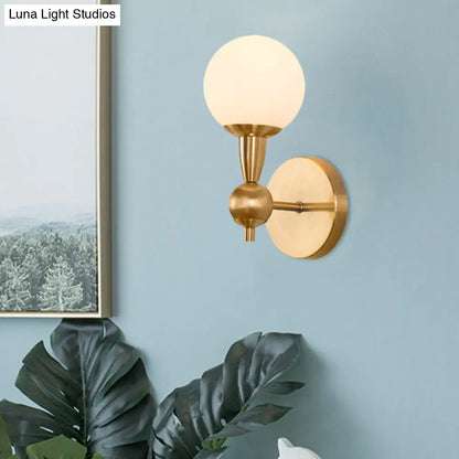 DecorBites™ Brass Orb Wall Mount Light with Opal Glass Lampshade - Mid Century Wall Lighting Idea