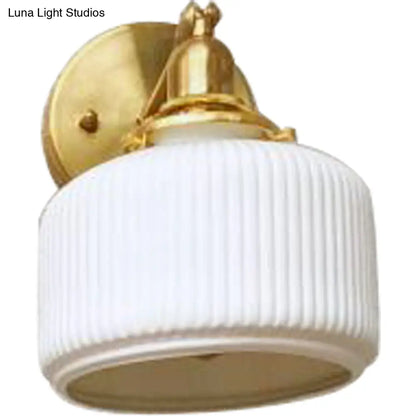 DecorBites™ Brass Pivot Joint Foyer Sconce: Round Ribbed Glass Wall Light with White Simplicity (1 Bulb)