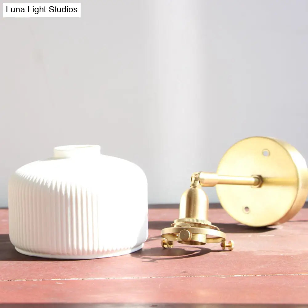 DecorBites™ Brass Pivot Joint Foyer Sconce: Round Ribbed Glass Wall Light with White Simplicity (1 Bulb)