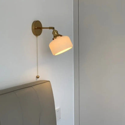 DecorBites™ Brass Pivot Joint Foyer Sconce: Round Ribbed Glass Wall Light with White Simplicity (1 Bulb)