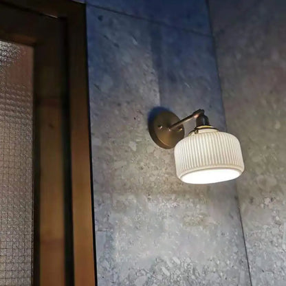 DecorBites™ Brass Pivot Joint Foyer Sconce: Round Ribbed Glass Wall Light with White Simplicity (1 Bulb)