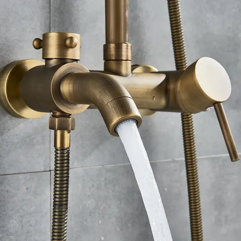 Antique brass rainfall shower faucet with curved spout and two flexible hoses for bathroom use