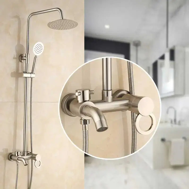 Modern brushed nickel rainfall shower faucet with overhead rainhead and handheld spray in sleek minimalist design
