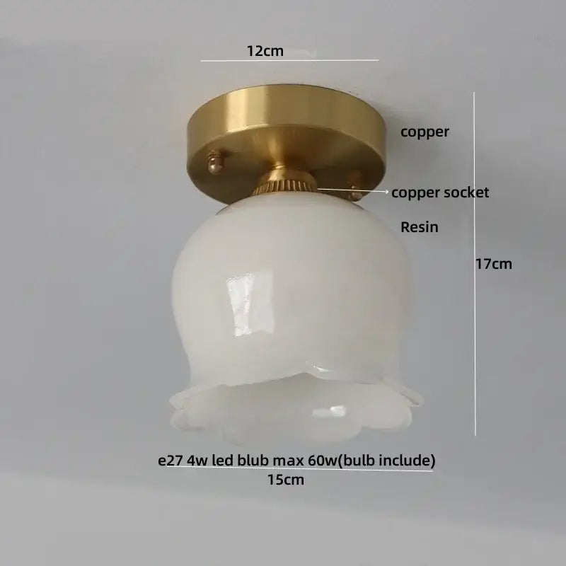 A white resin fluted lampshade with a brass copper base in a brass red butterfly glass led ceiling light decorbites butterfly glass design